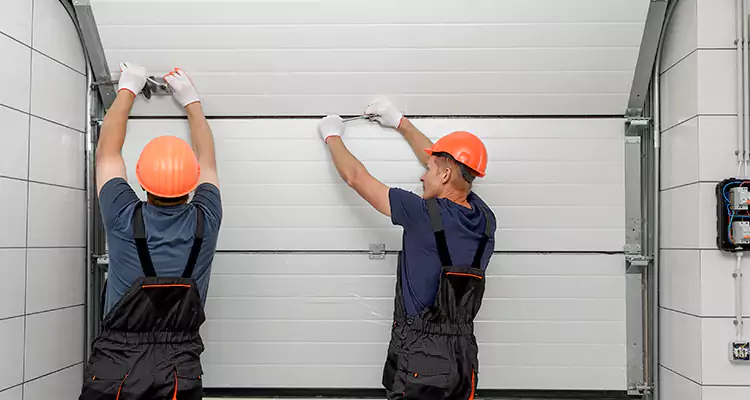 Garage Door Bottom Panel Repair in Parkland, FL